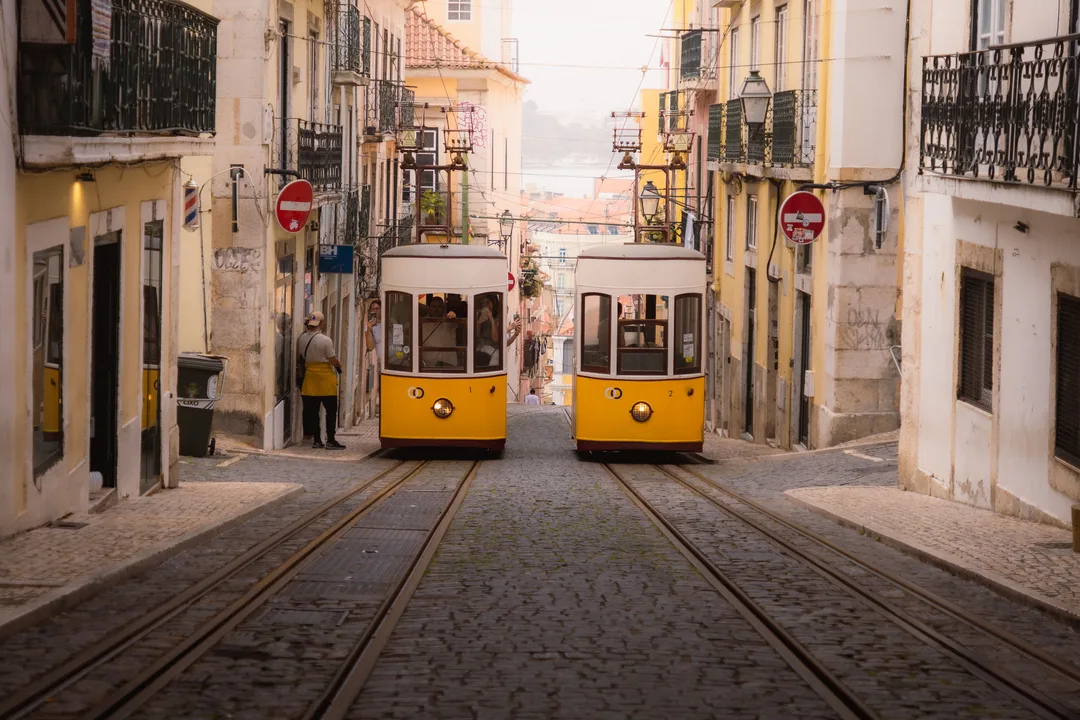 Historic yellow tram in Lisbon — from Lisbon Airport to city center guide