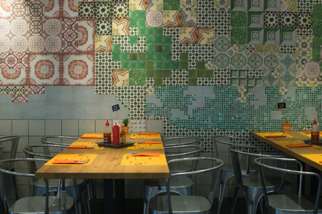 Tiled dining room of a traditional tasca restaurant in Lisbon