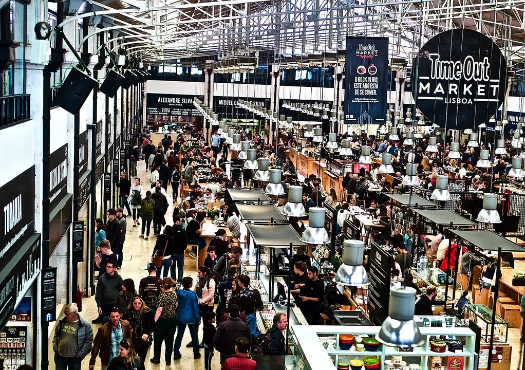 Interior of the Mercado da Ribeira food hall in Lisbon